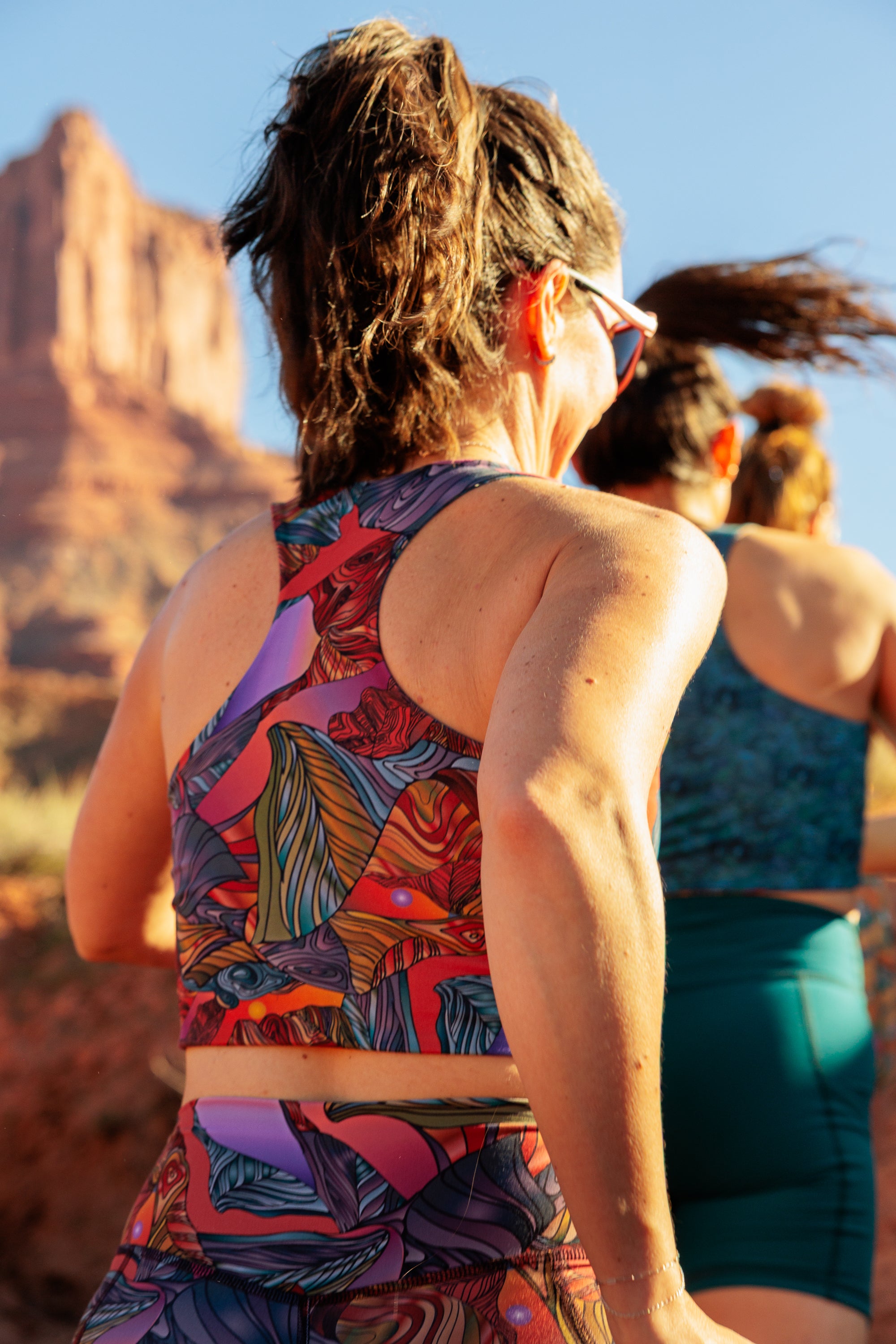 Commit reversible Croptop in Blueprint and Race To The Top print, back view